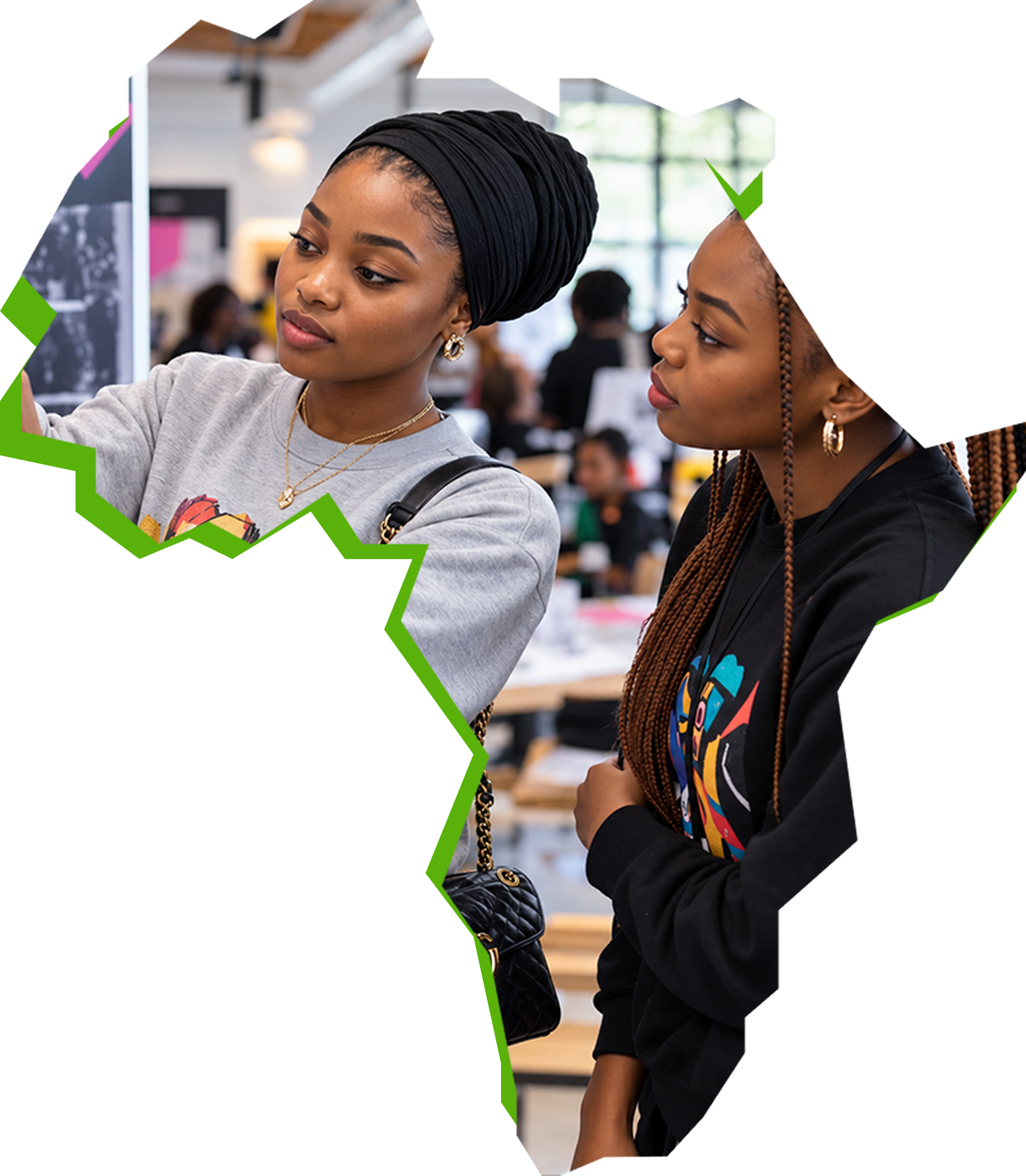 Two young Black women participating in a community activity